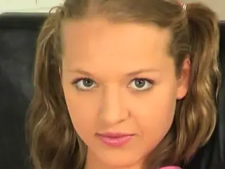 Latvian busty babe sucks golden dildo